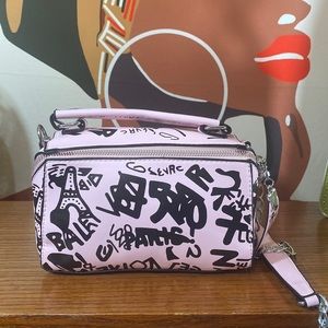 Graffiti Pink crossbody bag with detachable straps. Check pics for measurements